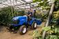 Preview: Kompakttraktor New Holland BOOMER 25 bei der Arbeit